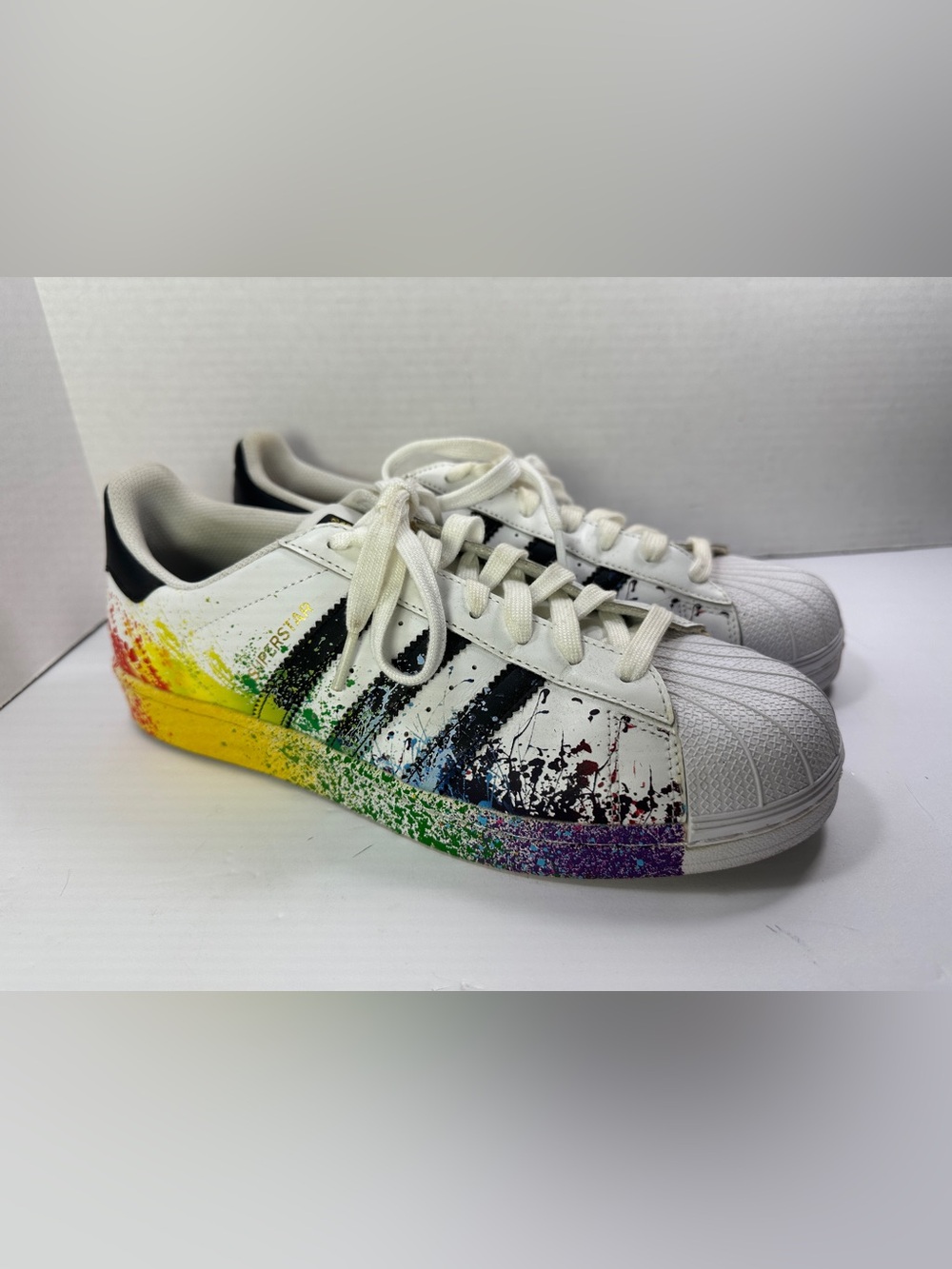 Adidas Men’s Pride Sneakers 9.5 White Rainbow Paint Splatter